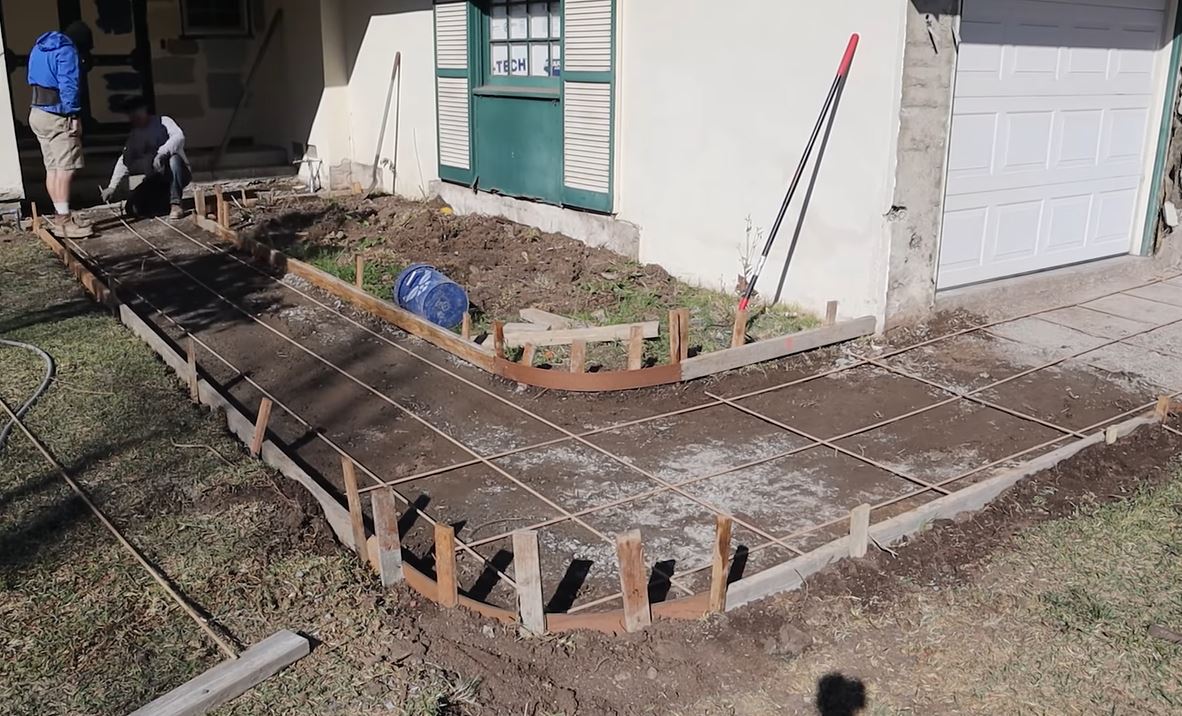 curved concrete walkway forms rebar installation residential project